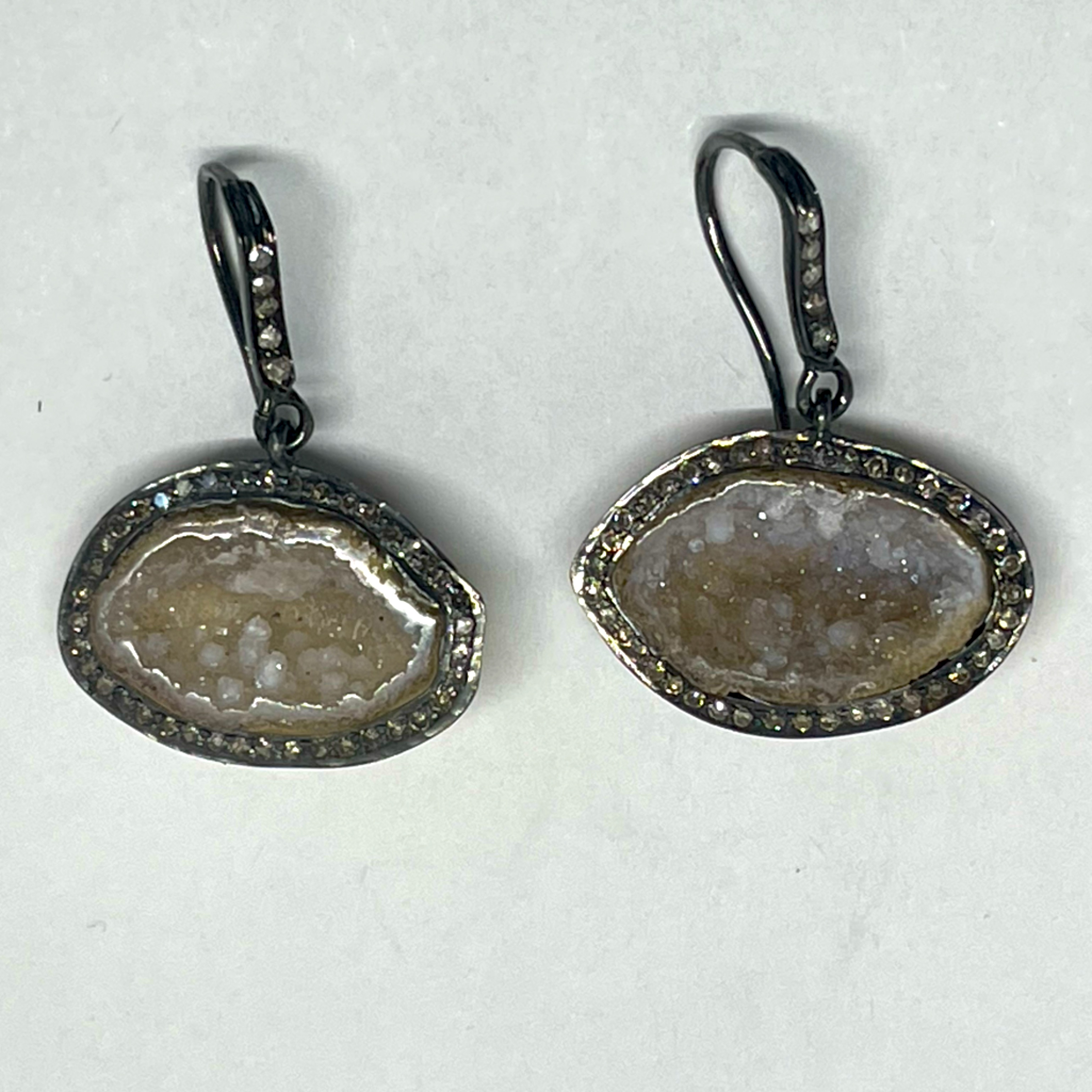 A Pair Of Diamond And Druzy Geode Earrings